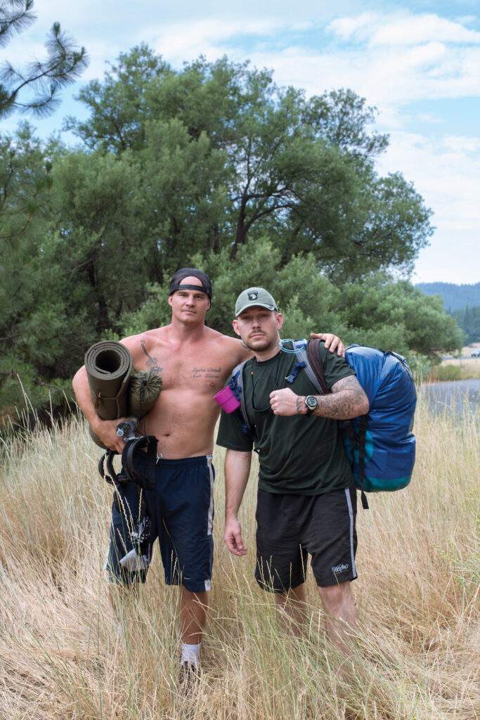 Matt Huffman (left) and Zeb Virgil (right) gear up for four days whitewater rafting on the Tuolumne River with their fellow veterans.