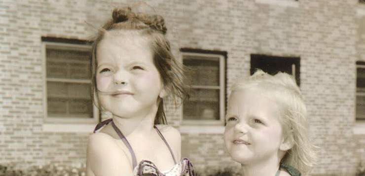 sisters in bathing suits