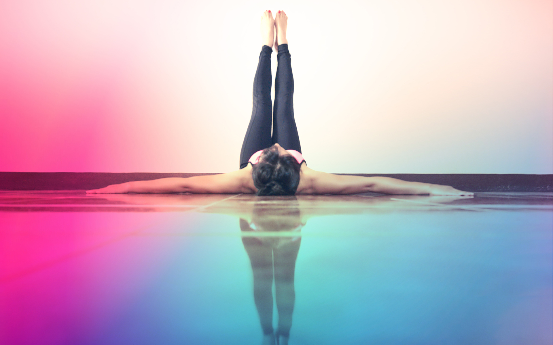 A Guided Meditation to Give Gratitude for Your Body - Blurred background of Yoga Woman feet up relaxing on wall