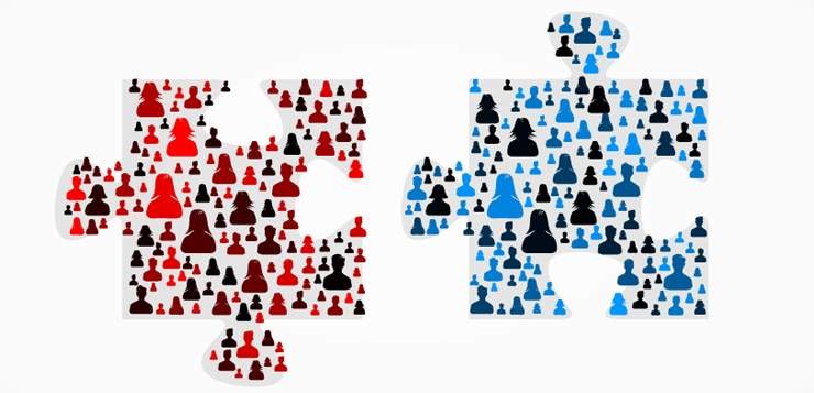 Puzzle made out of large group of people silhouettes