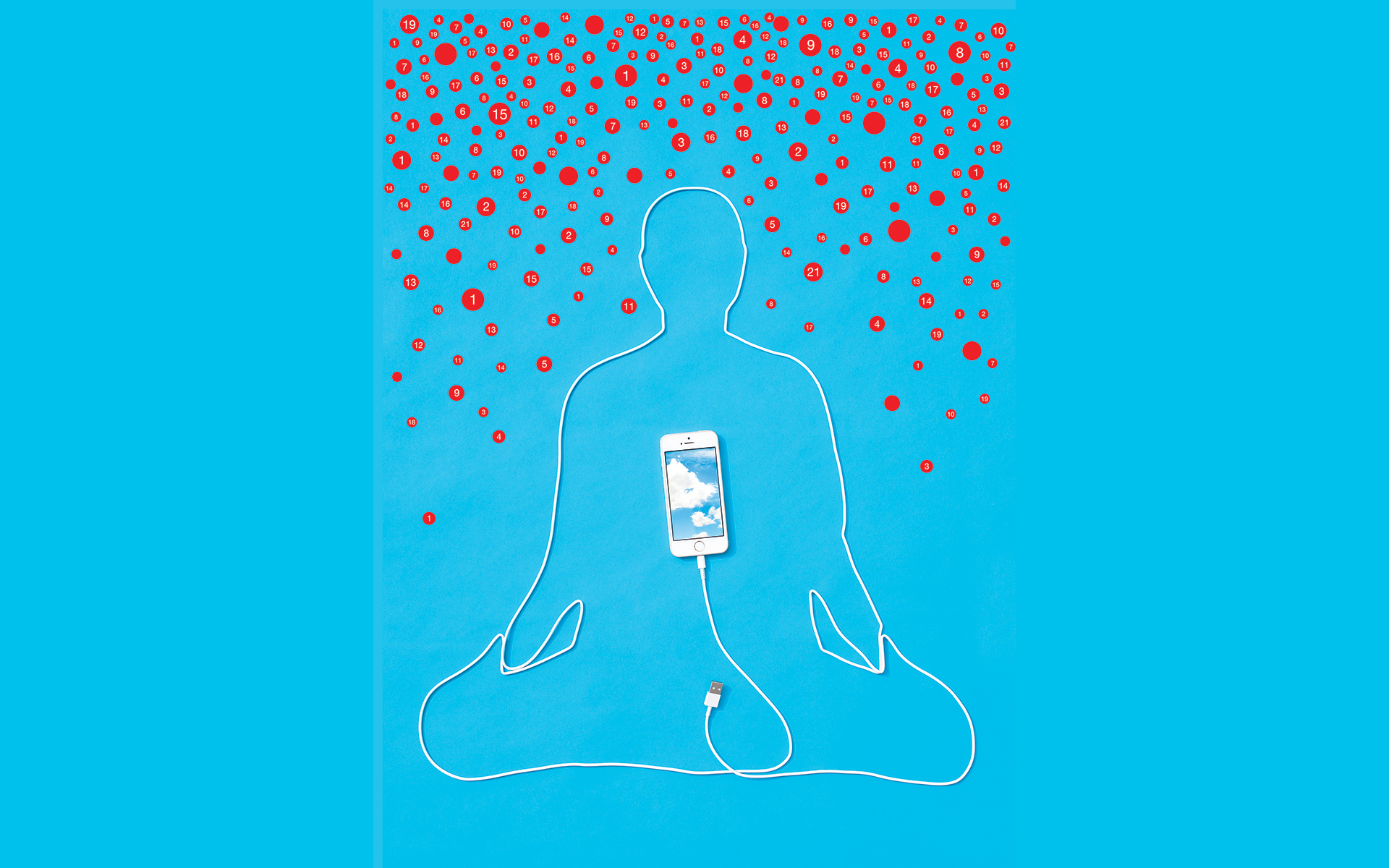 person meditating with phone