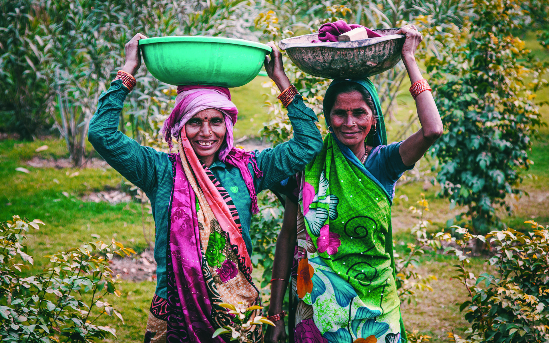 Women carrying baskets on head