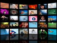 A grid of 25 small screens displaying various images such as people, sports, nature, technology, and abstract designs. The screens are arranged in a curved, panoramic style on a black background.