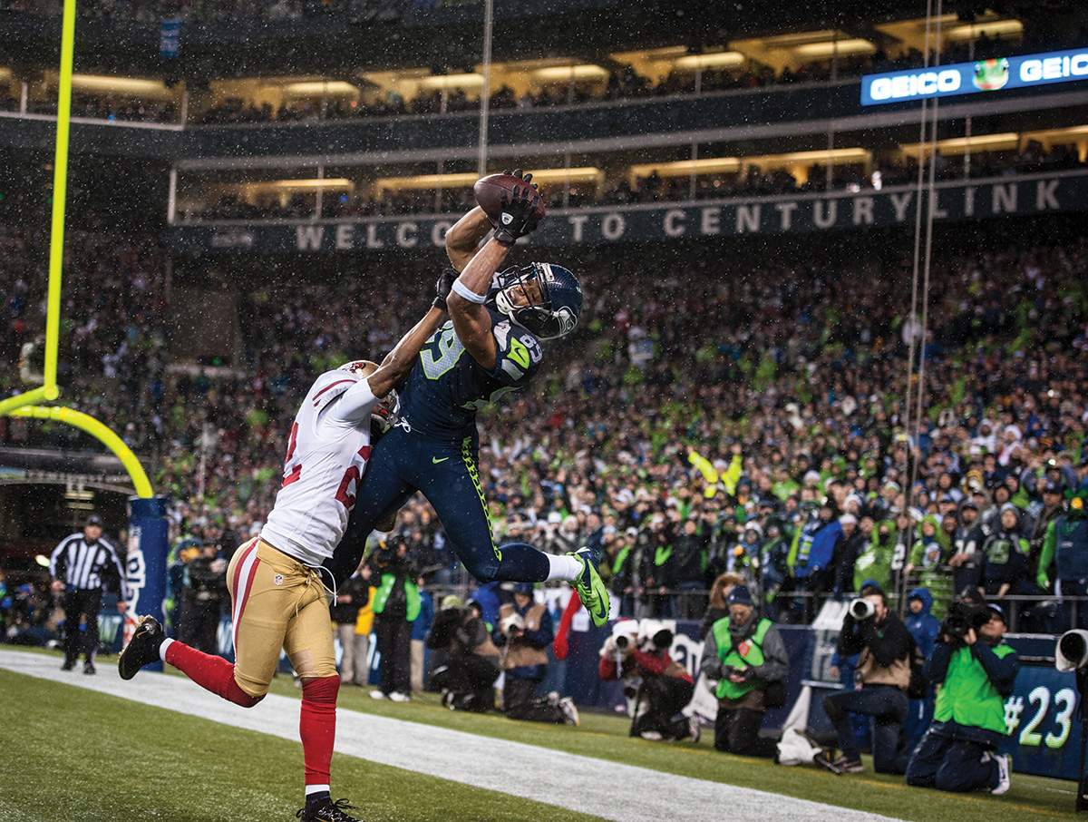 Players are more likely to perform at their peak when they've been trained to maintain focus, Carroll believes. Wide receiver Doug Baldwin, #89, eludes San Francisco 49ers cornerback Carlos Rogers, #22, with a well-timed leap to score a touchdown.