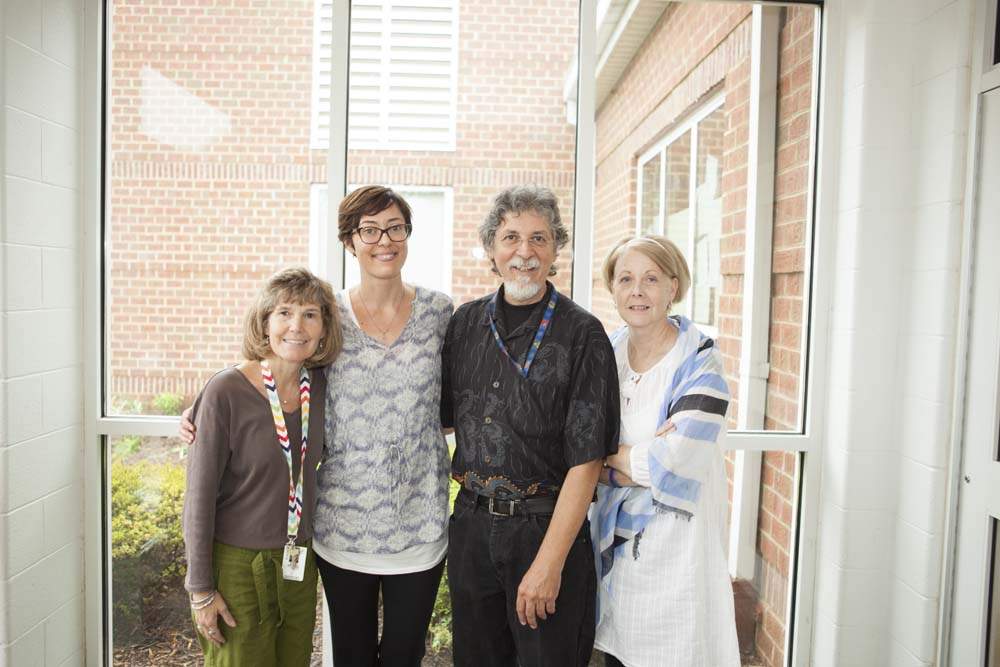 Fourth-grade teachers Beth Roesch and Mr. Briedis-Ruiz (first and third from the left) and fifth-grade teacher Kathy Shupe (far right) agree that Marian’s class has allowed their students to increase their mindful behavior both in and out of the classroom. “I think it’s huge,” Ms. Shupe said. “I think it’s what our school systems are missing. And I think if we don’t do that, if we don’t slow them down, slow their brain down, and get them to think about what they’re made of and who they are, we’re going to lose them. So I’m just so grateful that it’s been sponsored in our schools.”