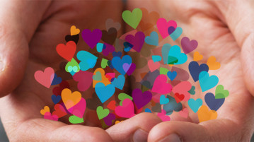 Don’t Fall into the Self-Esteem Trap: Try a Little Self-Kindness hands holding hearts