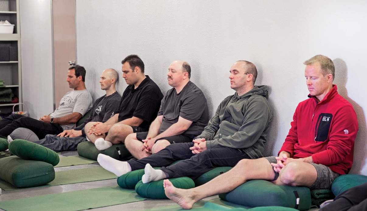 Hillsboro police officers try mindfulness meditation. From left, Roberto DiGiulio, Mark Vertner, Kelly Hickman, Kevin Harrison, Kurt Van Meter, and Jeff Branson.