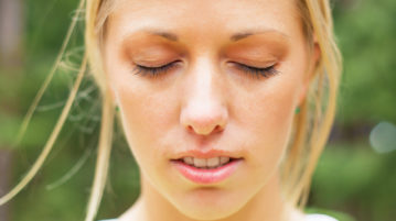 A Guided Breathing Meditation to Cultivate Awareness woman with eyes closed