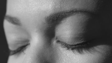 A 10-Minute Meditation to Help You Solve Conflicts at Work women with eyes shut