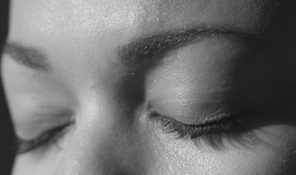 A 10-Minute Meditation to Help You Solve Conflicts at Work women with eyes shut