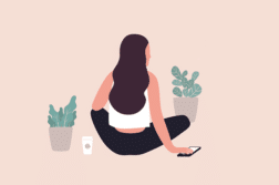 woman sitting with phone