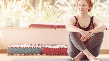 An 11-Minute Awareness of Breath Practice woman on yoga mat