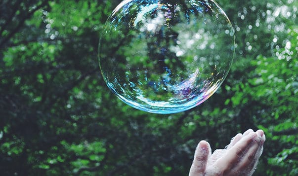 A Mindful Kids Practice: The Breath Ball Hands reaching to bubble