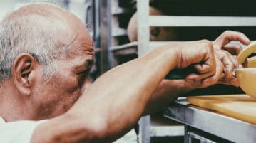 Does Meditation Boost Creativity? man carving cheese in Montreal
