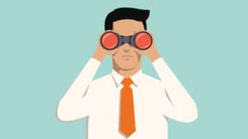 How to Avoid Confirmation Bias at Work man in suit with binoculars