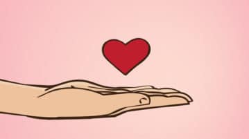 How Loving-Kindness Meditation Makes You a Better Human illustration hand with heart hovering over it