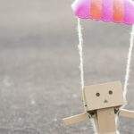 To Be Happy, Fail and Try Again Stick figure with parachute