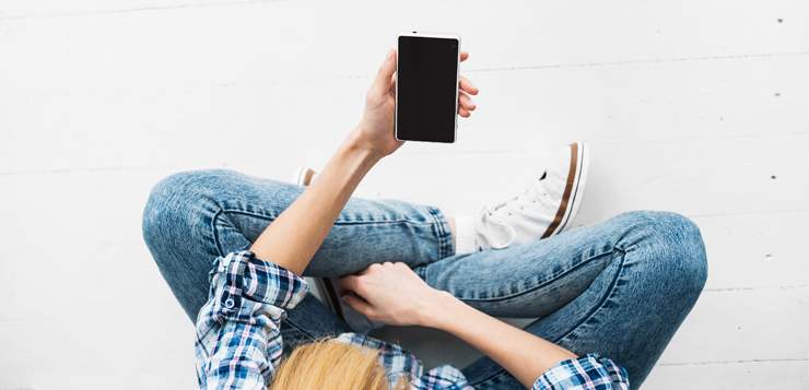 woman looking at phone