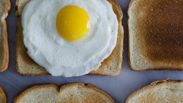 What to Eat in the Morning? egg on toast in a row of toast