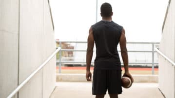 Daily Meditation Can Keep Athletes Primed for Training Rear view of a football player