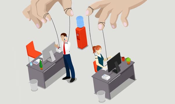 Are You a Micromanager? How to Be Mindful of Being Counterproductive illustration of office workers on strings like puppets