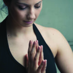 Using Yoga to Stretch the Mind Woman doing yoga